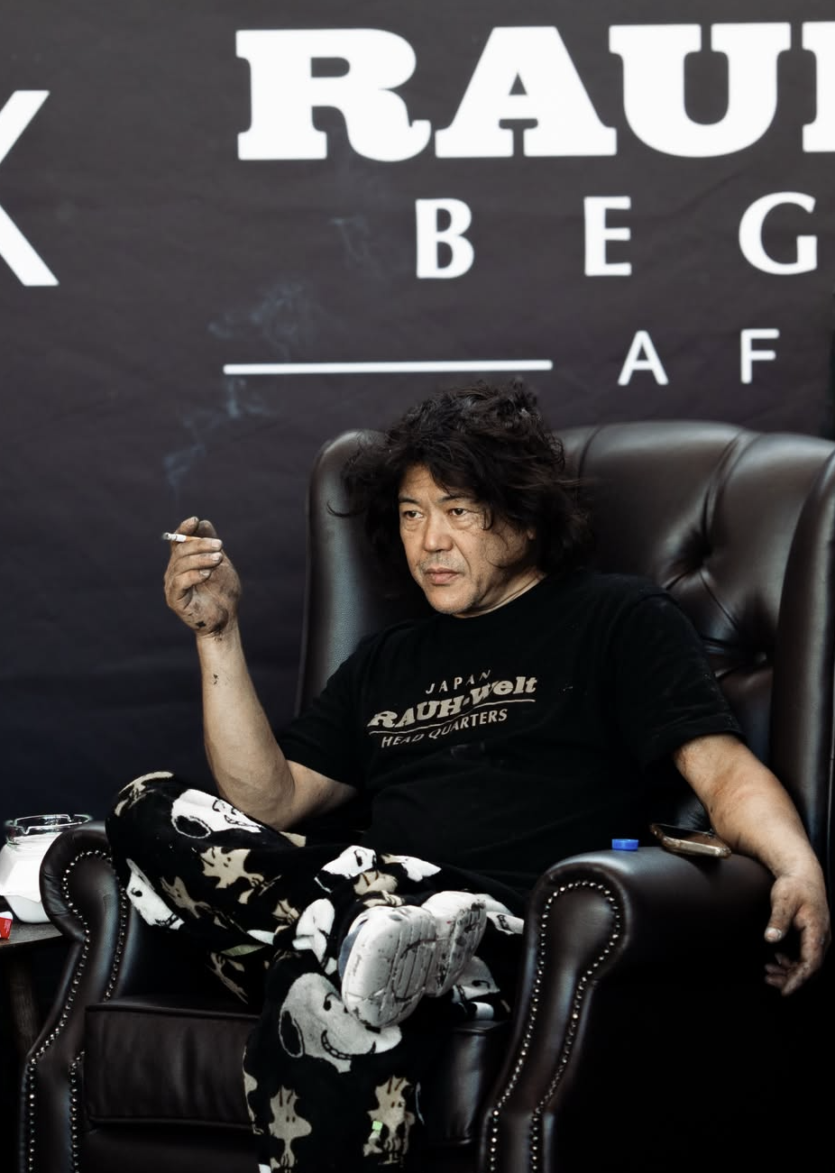 Akira Nakai backstage at JHB Idle Expo 2026, mid-build