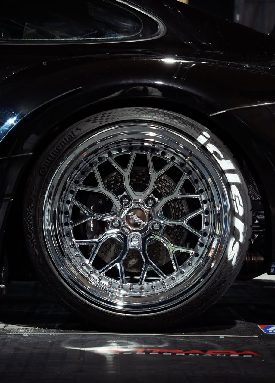 Close-up of the finished multi-piece forged wheel, mounted